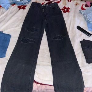 Dark washed ripped 90’s jeans